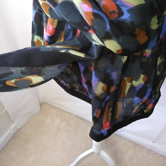 CAbi Flaunt Wrap Sleeveless Drape Front Blouse - Picture 6 of 9